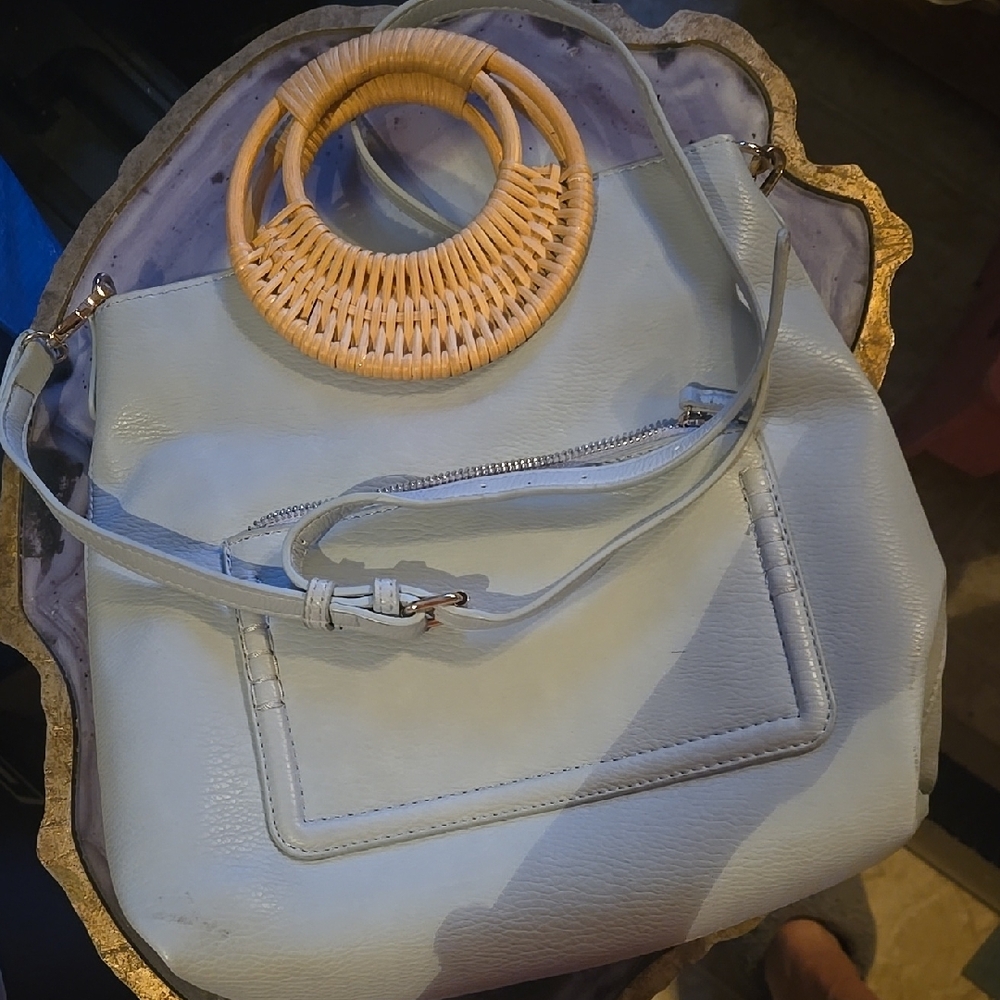 Cream Shoulder Bag with Unique Circular Handle and Slouchy Silhouette